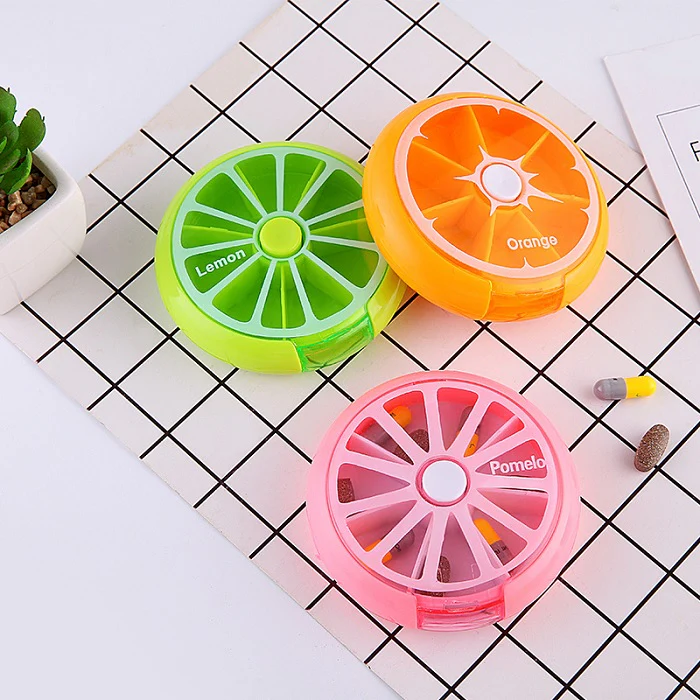 7 Compartment Weekly Pill Box – Rotating Round Storage Box for Medicines (Random color- Pack of 1) - Image 2
