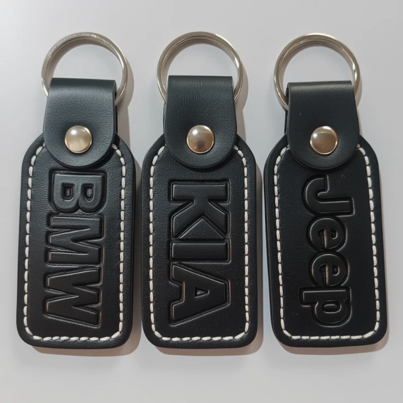 Premium Black Leather Keychain – BMW / KIA / Jeep Embossed logos with metallic key rings and snap closures (Random color-Pack of 1) - Image 2